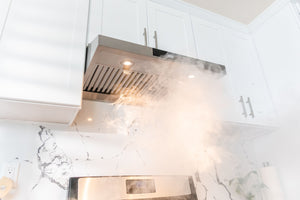 the Hauslane UC-PS18 range hood sucking up smoke