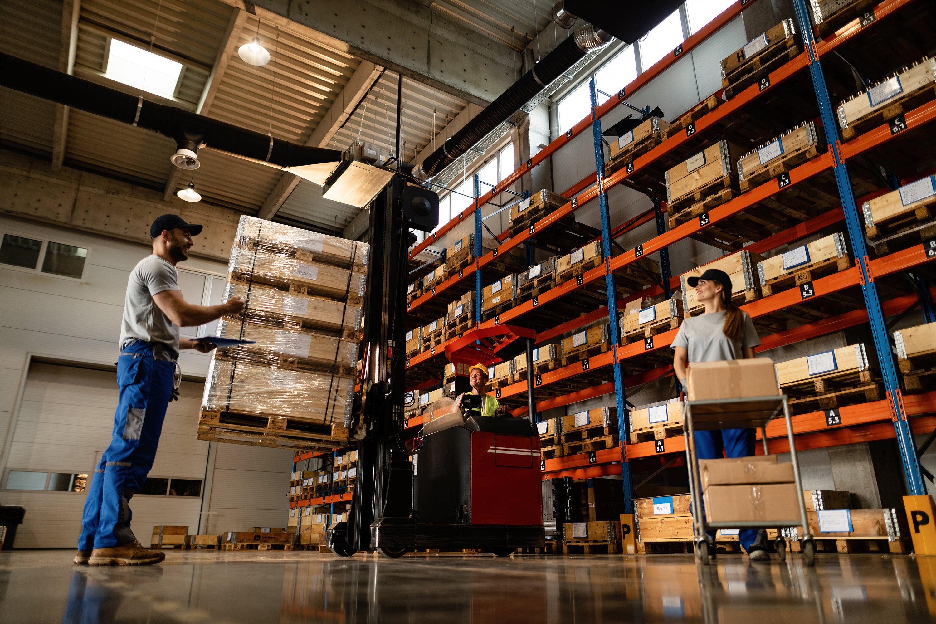 Warehouse with pallet of boxes preparing to delivery kitchen range hoods.
