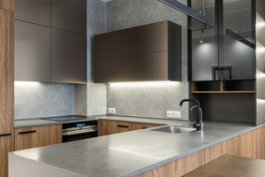 sleek kitchen with black and grey color pallet