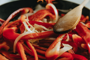 peppers and onions getting cooked